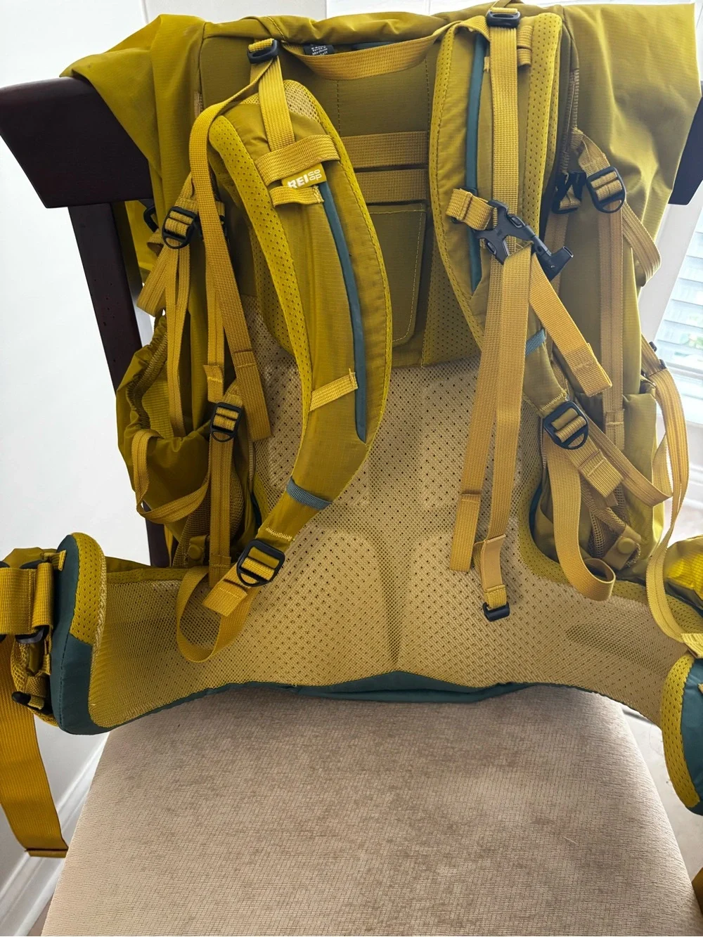 Women’s REI Flash 55 Backpack in Mustard with Green Base